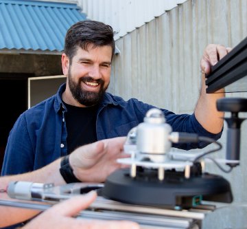 An engineer working on a smart device